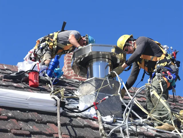 Protective chimney cap installed by Copley Chimney Sweep in Copley, OH