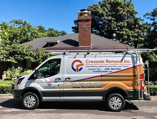 Copley Chimney Sweep technician removing creosote safely in Copley, OH