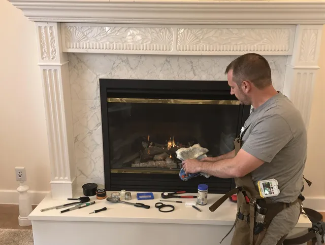 Copley Chimney Sweep performing fireplace maintenance in Copley, OH