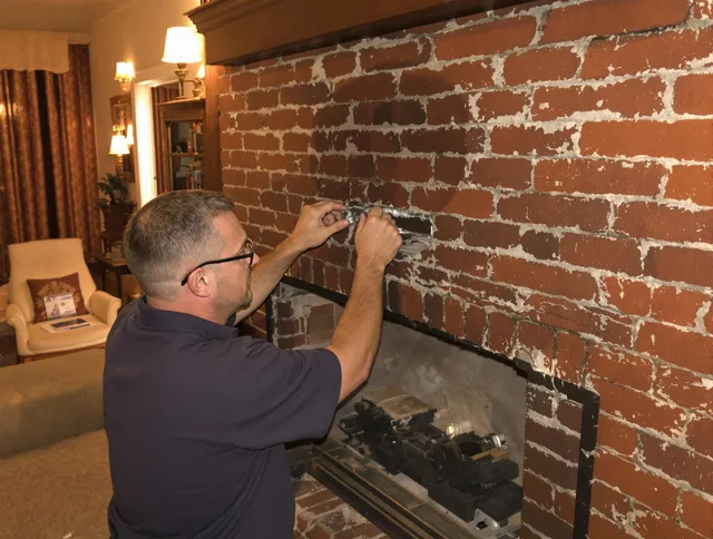 Copley Chimney Sweep expert fixing a fireplace in Copley, OH